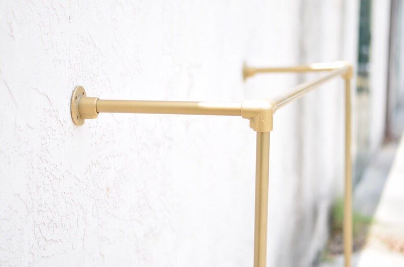 Wall Mounted Gold Clothing Display Rack